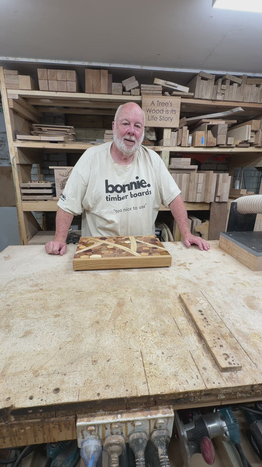 Wooden Charcuterie or Cutting Board-End Grain Slices of beautiful Wood set amongst Olive Branches.